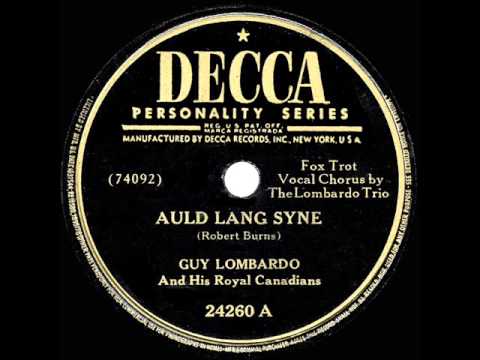 Guy Lombardo and His Royal Canadians play “Auld Lang Syne”